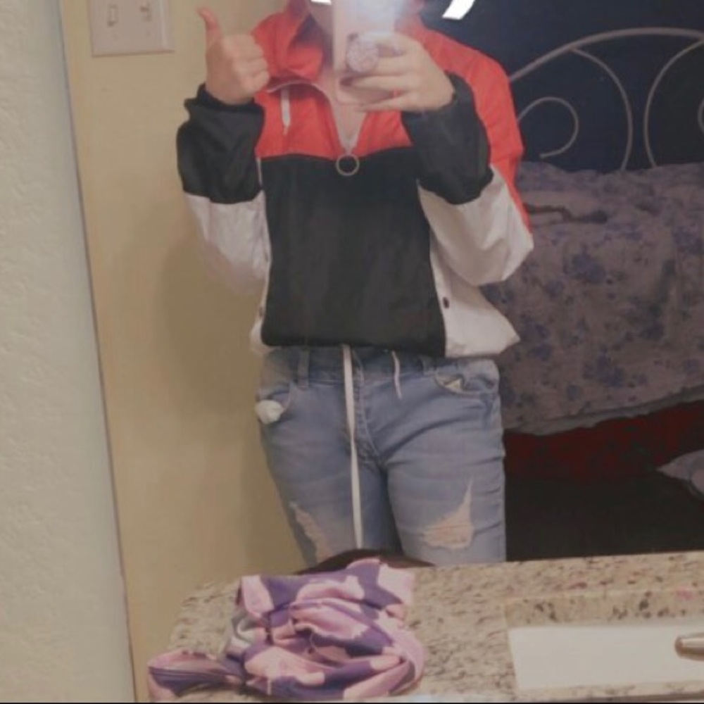 black, red, +white windbreaker